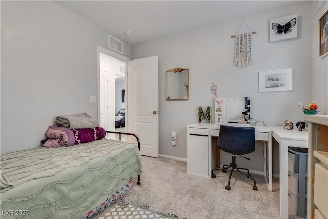 bedroom featuring light colored carpet, visible vents, and baseboards