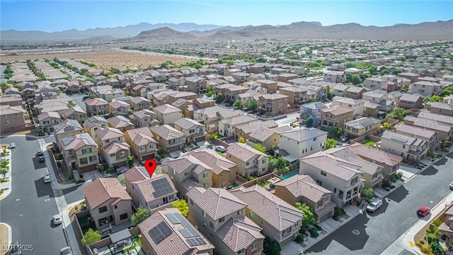 bird's eye view with a residential view and a mountain view