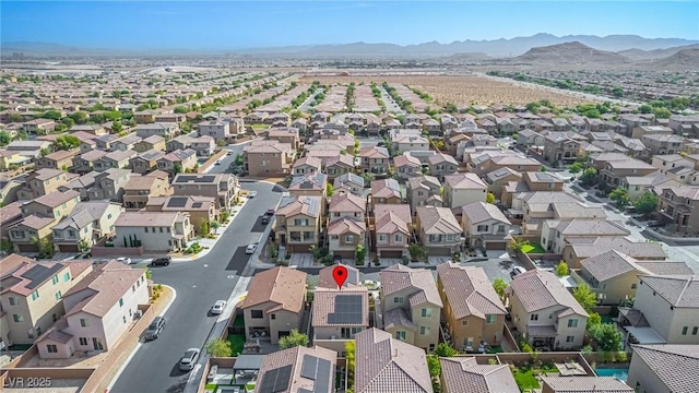 bird's eye view featuring a residential view and a mountain view