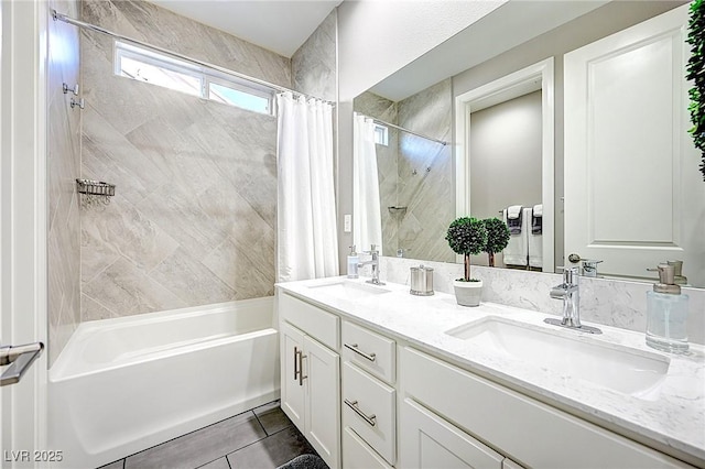 full bathroom featuring tile patterned flooring, a sink, shower / bathtub combination with curtain, and double vanity