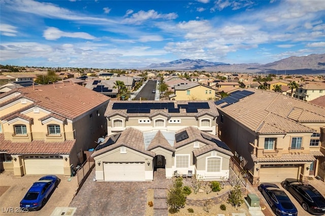 aerial view featuring a residential view and a mountain view