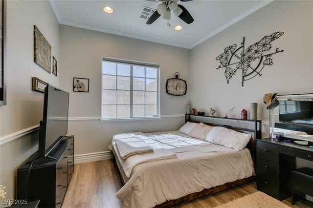 bedroom with visible vents, baseboards, recessed lighting, crown molding, and light wood-type flooring