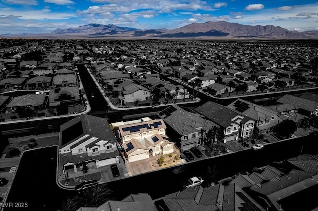 bird's eye view with a mountain view and a residential view