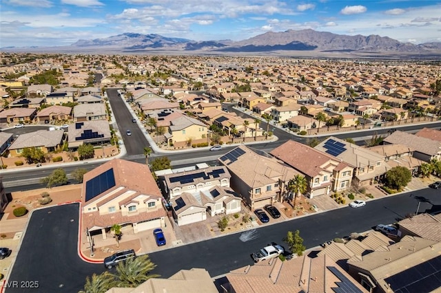 birds eye view of property featuring a mountain view and a residential view