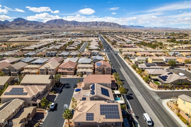 drone / aerial view featuring a mountain view and a residential view