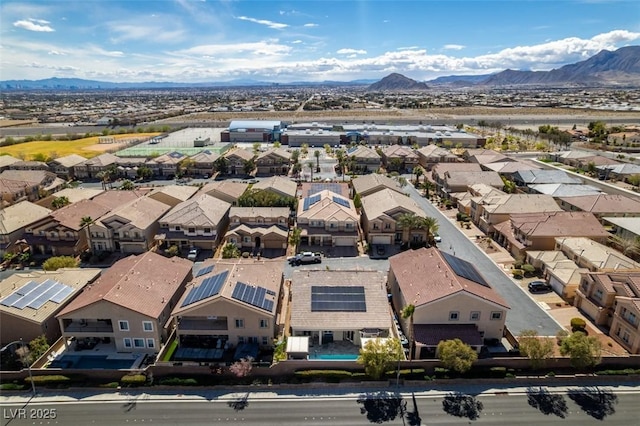 drone / aerial view featuring a mountain view and a residential view