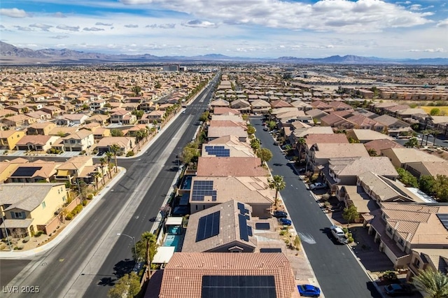 drone / aerial view featuring a mountain view and a residential view