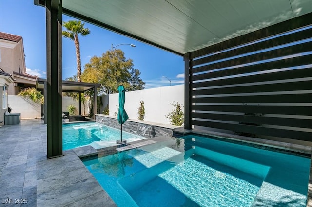 view of swimming pool featuring a patio area, a fenced in pool, and a fenced backyard