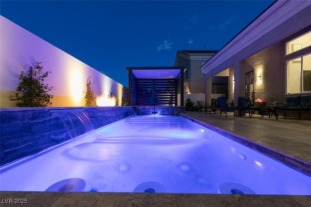 pool at twilight featuring a fenced in pool and a patio