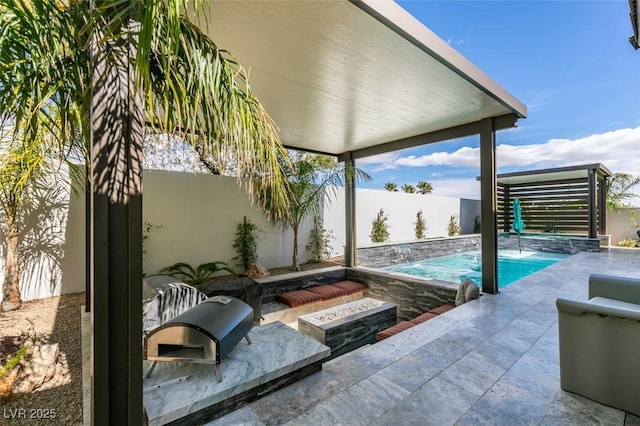 view of patio / terrace with a fenced in pool and a fenced backyard