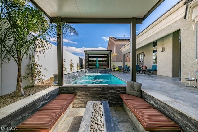 view of swimming pool with a fenced backyard and a patio