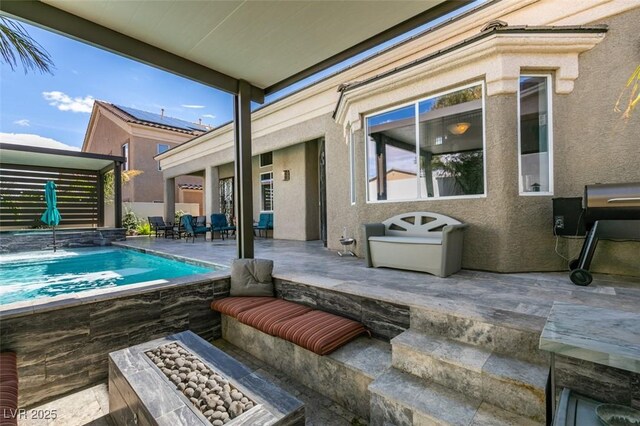 pool with a patio