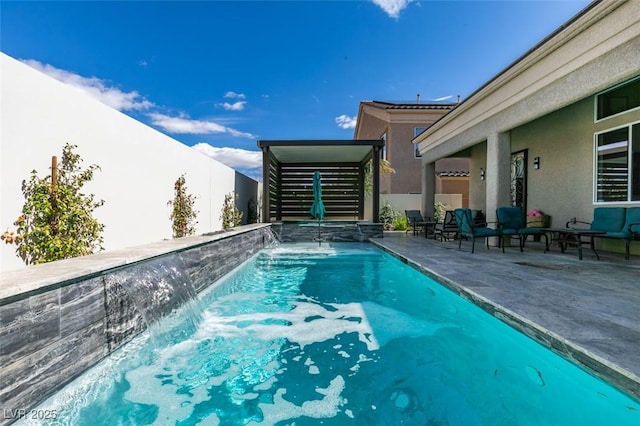 view of pool with a fenced in pool and a patio