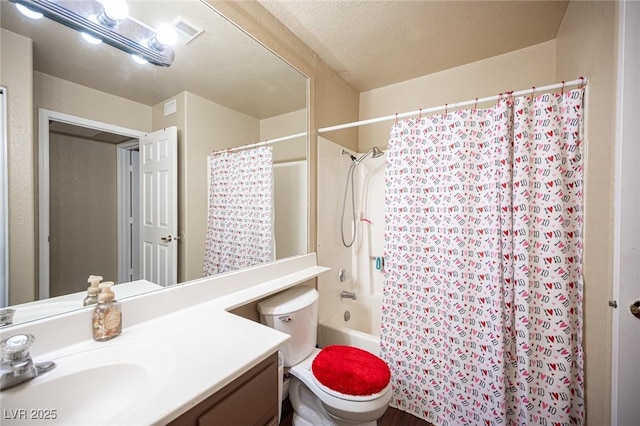 bathroom with visible vents, toilet, shower / tub combo, vanity, and a textured ceiling