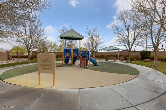 community jungle gym featuring fence