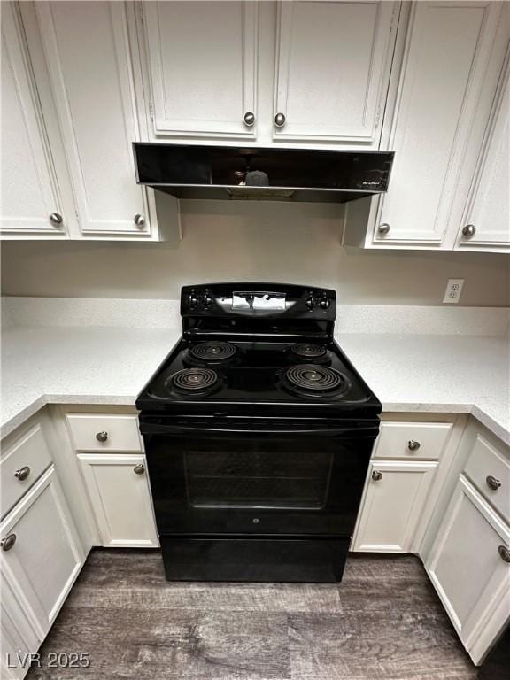 kitchen with under cabinet range hood, white cabinets, black electric range oven, and light countertops