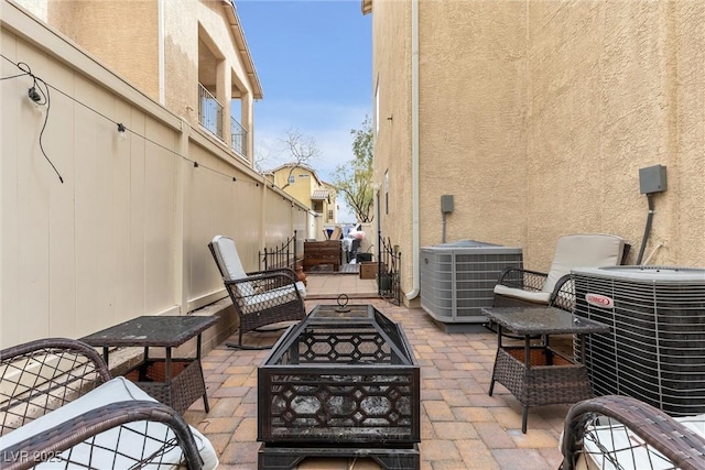 view of patio / terrace with an outdoor hangout area and cooling unit