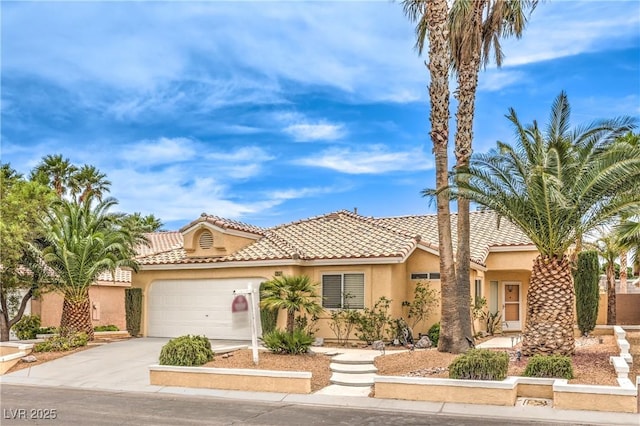 7613 Falconwing Ave, Las Vegas, NV 89131 - view of front of property featuring stucco siding, driveway, a garage, and a tiled roof