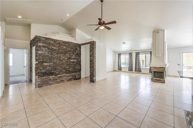 7613 Falconwing Ave, Las Vegas, NV 89131 - unfurnished living room with plenty of natural light, ceiling fan, light tile patterned flooring, high vaulted ceiling, and recessed lighting