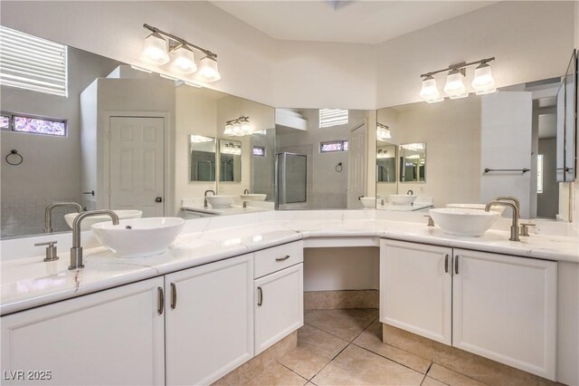 7613 Falconwing Ave, Las Vegas, NV 89131 - bathroom with double vanity and tile patterned flooring