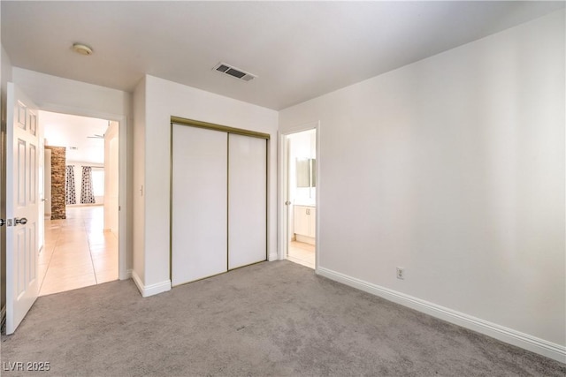 7613 Falconwing Ave, Las Vegas, NV 89131 - unfurnished bedroom featuring carpet flooring, baseboards, a closet, and ensuite bath