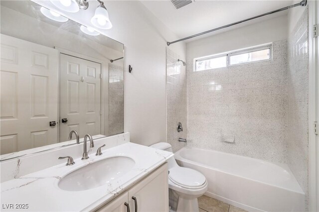 7613 Falconwing Ave, Las Vegas, NV 89131 - bathroom featuring bathtub / shower combination, toilet, vanity, and tile patterned floors