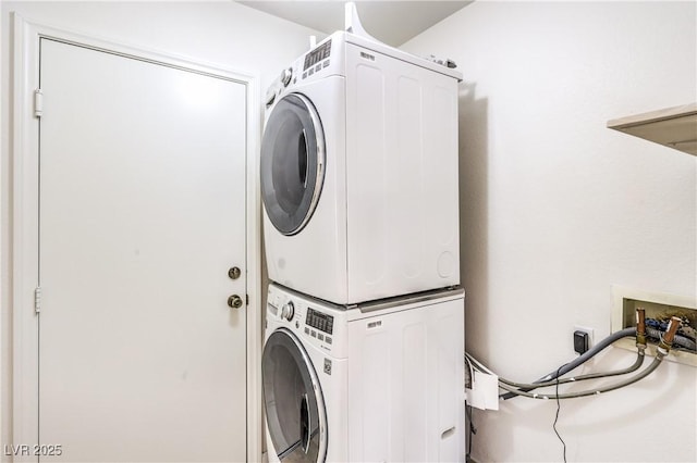 7613 Falconwing Ave, Las Vegas, NV 89131 - washroom featuring stacked washer / drying machine