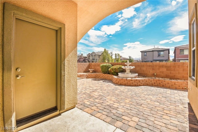 view of patio / terrace with fence