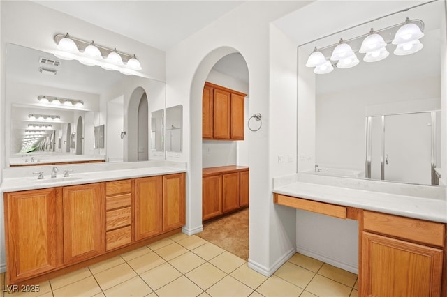 bathroom featuring tile patterned flooring, visible vents, and vanity