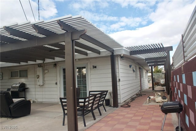 view of patio / terrace with outdoor dining space, area for grilling, and a pergola