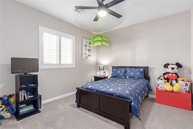 carpeted bedroom featuring baseboards, visible vents, and ceiling fan