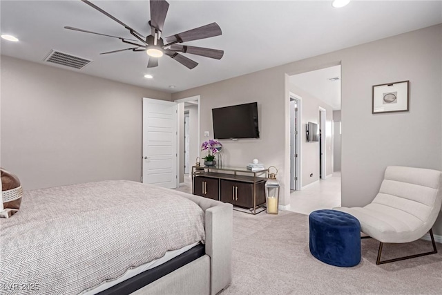 bedroom featuring recessed lighting, visible vents, light carpet, and ceiling fan