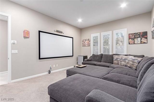 home theater room featuring carpet flooring, recessed lighting, and baseboards