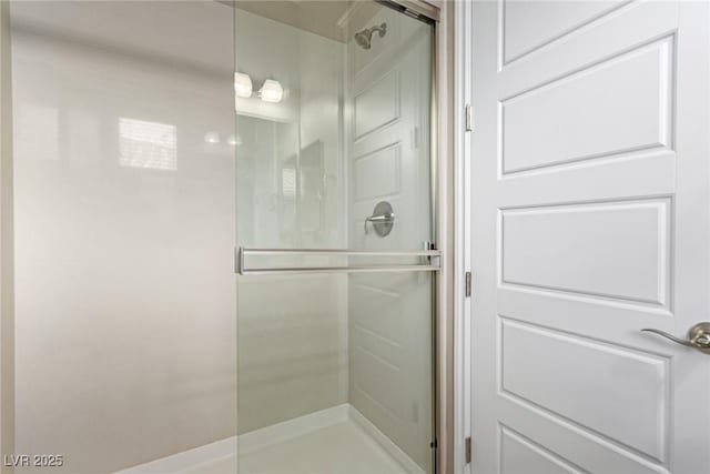 bathroom with a stall shower