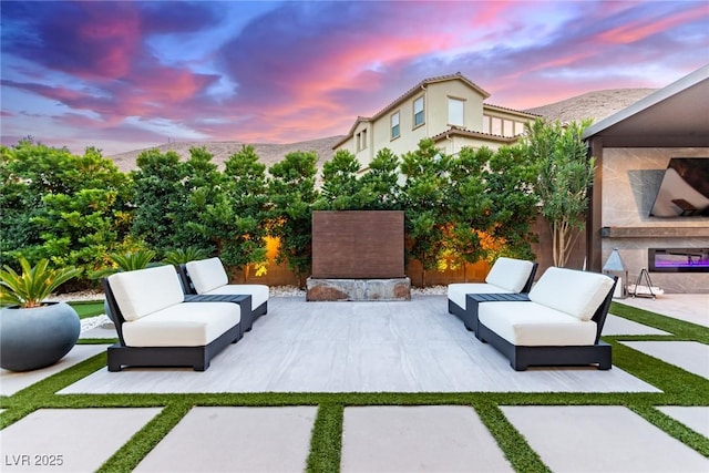 view of patio featuring outdoor lounge area and a fenced backyard