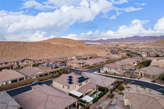 drone / aerial view featuring a mountain view and a residential view