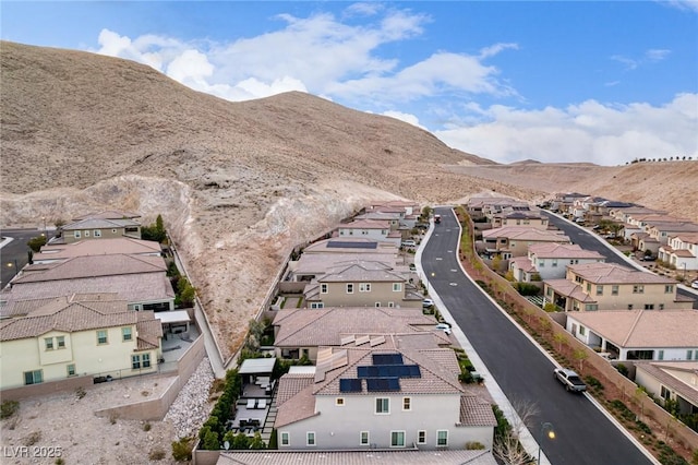 aerial view featuring a mountain view and a residential view