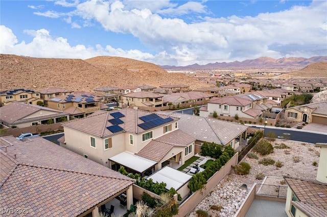 bird's eye view with a mountain view and a residential view