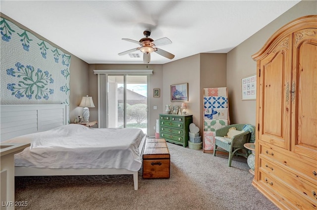 carpeted bedroom featuring access to outside and a ceiling fan