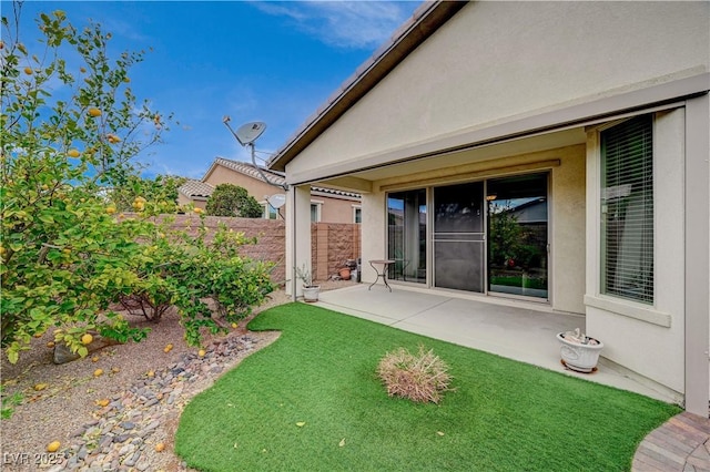 view of yard with a patio area and fence