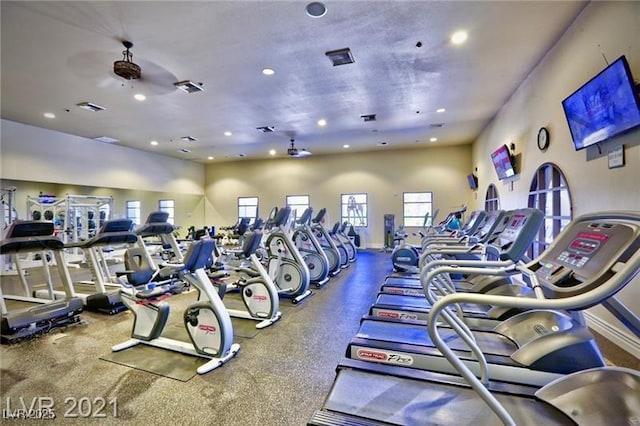 workout area featuring recessed lighting, visible vents, and baseboards