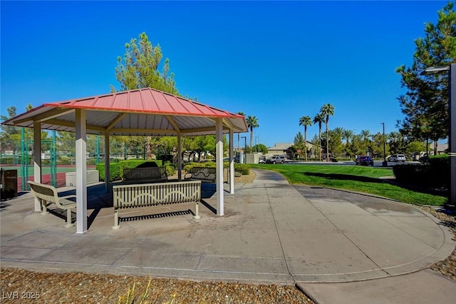 view of home's community with a gazebo, a lawn, and a patio