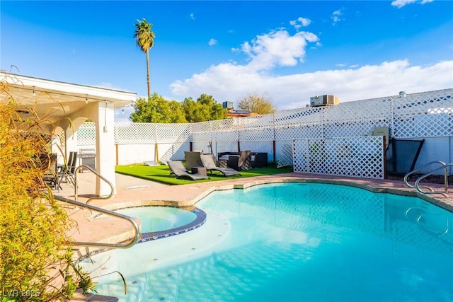 view of pool featuring a fenced in pool, central AC, a fenced backyard, a patio area, and an in ground hot tub