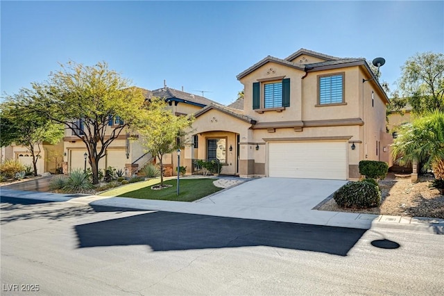 mediterranean / spanish house featuring a tiled roof, concrete driveway, a front yard, stucco siding, and a garage