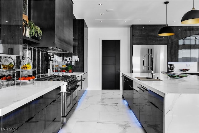 kitchen featuring dark cabinets, marble finish floor, modern cabinets, high end appliances, and a sink