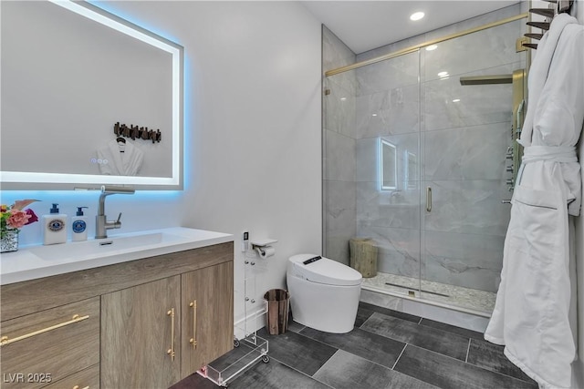 bathroom featuring vanity, toilet, and a stall shower