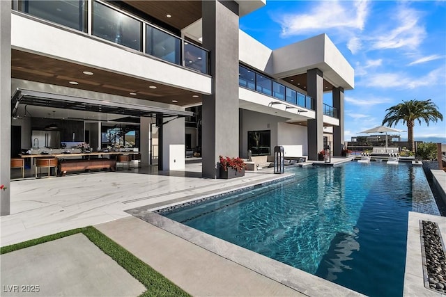 outdoor pool with a patio