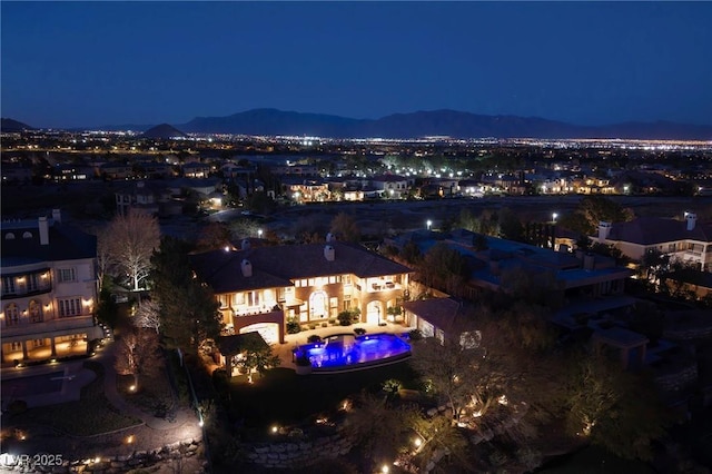 aerial view at twilight with a mountain view