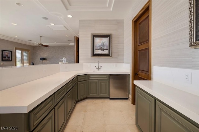 9801 Orient Express Ct, Las Vegas, NV 89145 - kitchen featuring light countertops, wallpapered walls, and refrigerator