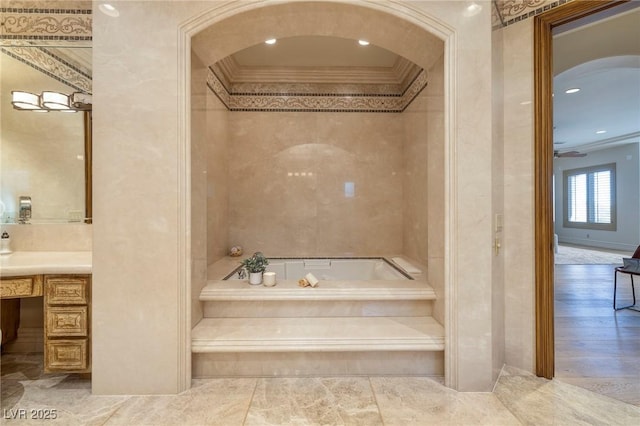 9801 Orient Express Ct, Las Vegas, NV 89145 - bathroom with vanity, ornamental molding, a ceiling fan, and a bath
